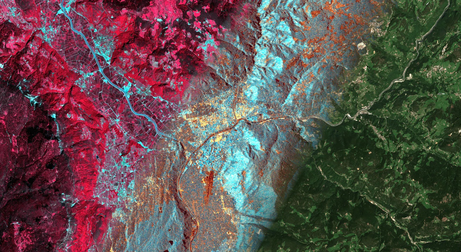 This image is view from the atmosphere of the city of Bolzano (Italy), created with a composition of data from two Copernicus satellite missions. The left part is a so-called "false color composite", using Sentinel-2 band 8 (near infrared), band 4 (red) and band 3 (green) for the EGB image channels. It is most commonly used to assess plant density and health. The central part is a color composition based on Sentinel-1 radar back-scatter of the two available polarizations, VV and VH. The right part is the classical RGB composite, using Sentinel-2 band 4 (red), band 3 (green) and band 2 (blue) for the RGB image channels. It resembles what our vision sees naturally and what we would see in a standard photo.